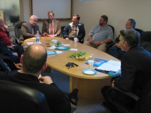 Meeting with publisher William Shaw and other business and community leaders in the offices of the Snoqualmie Valley Record newspaper.