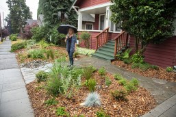 Employee Roberta King in her RainWise garden.